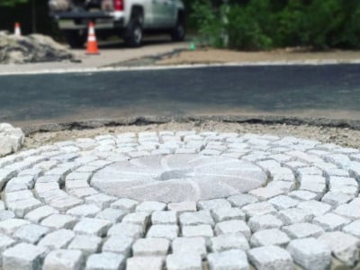 Bury Paving Contractors Laying Cobblestones in Bury